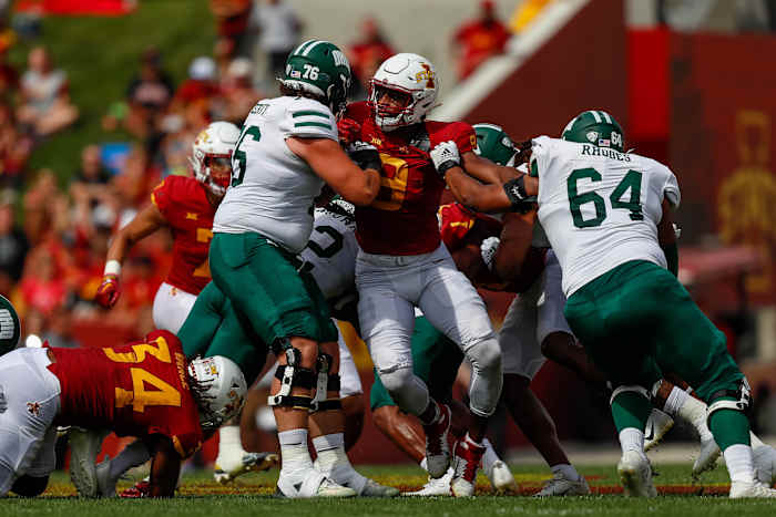 Iowa State defensive end Will McDonald IV (9) tries to get past Ohio offensive linemen Hagen Meservy (76) and Shedrick Rodes Jr. (64) during the game at Jack Trice Stadium in Ames, Iowa on Saturday, Sept. 17, 2022.